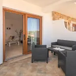 Appartamento Porto Pozzo Semesterbostad Porto Pozzo