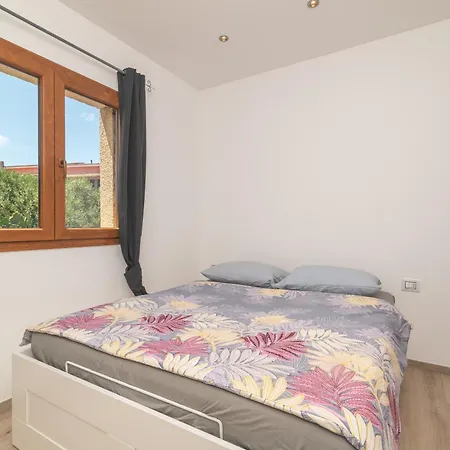 Appartamento Porto Pozzo بيت للعطل *