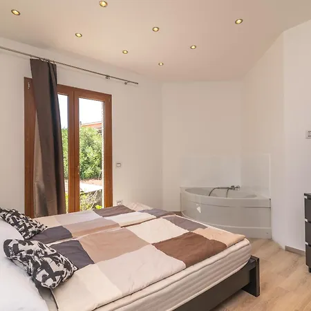 Appartamento Porto Pozzo Tatil Evi Porto Pozzo